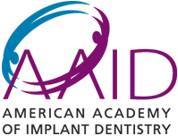 The image displays a logo with stylized text and graphic elements, which appears to be associated with an organization named  AID   American Implant Dentistry  under the umbrella of  AMERICAN ACADEMY OF IMPLANT DENTISTRY.